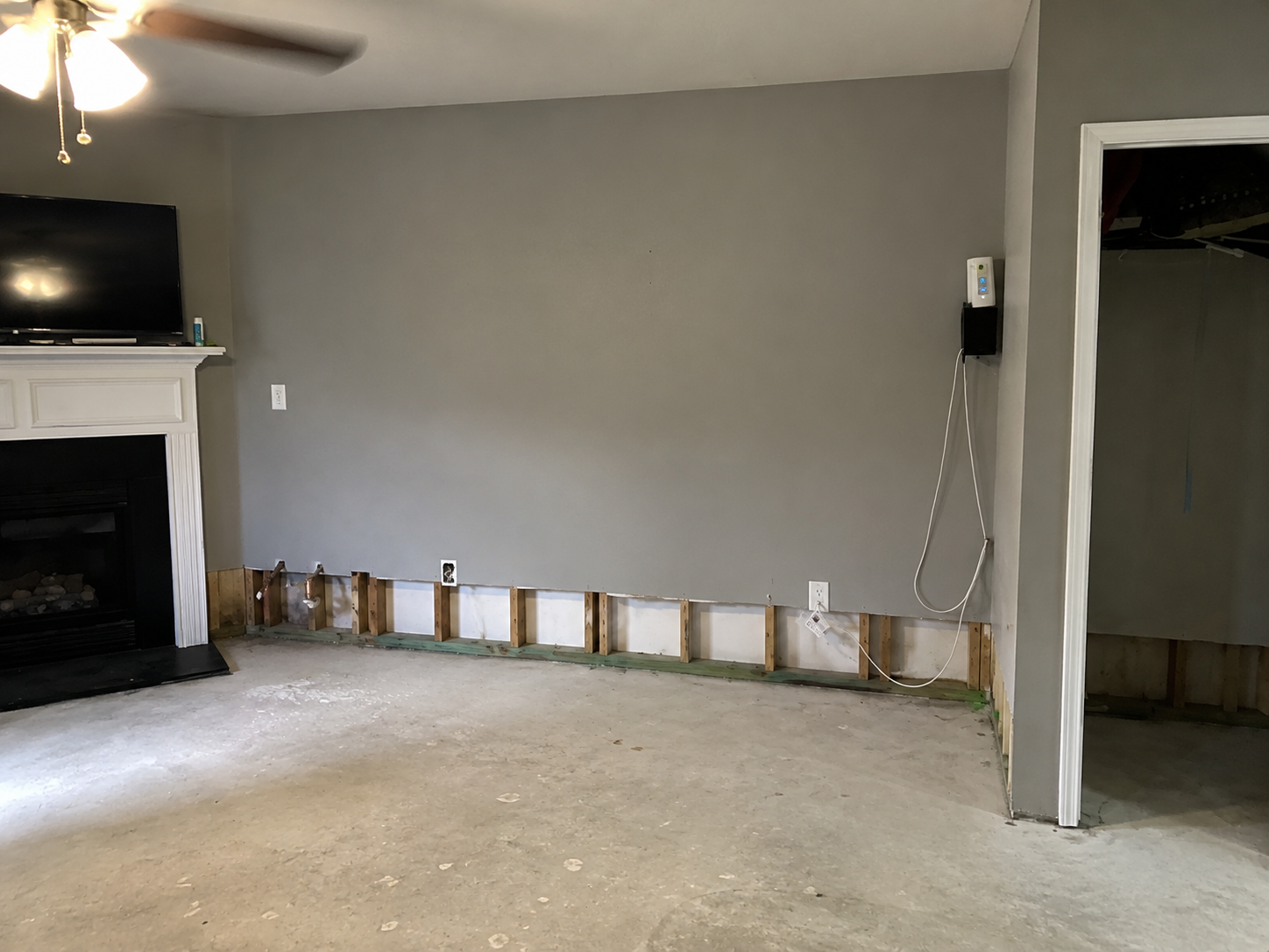 drywall and carpet removed during basement water damage restoration Minneapolis